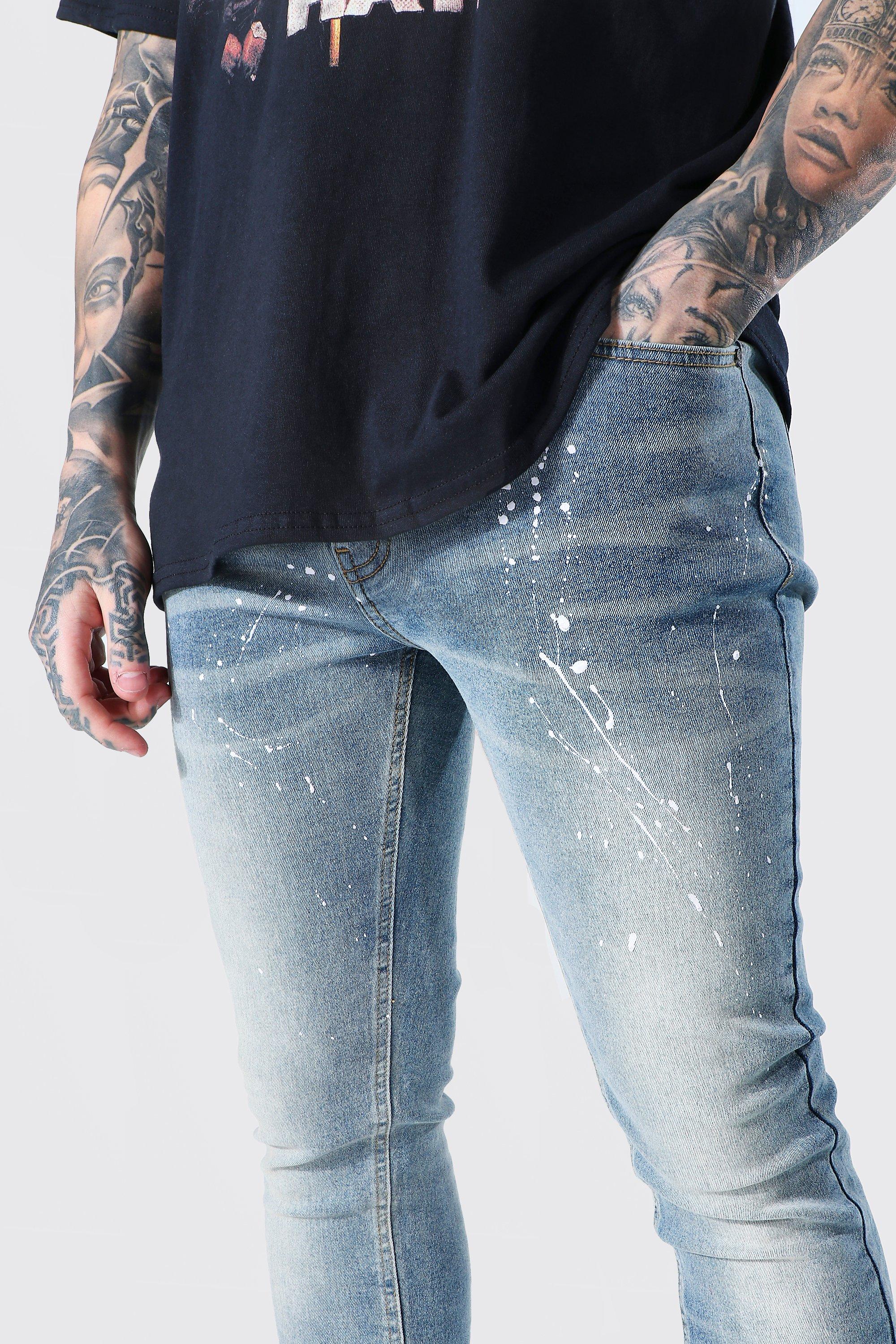 Jeans stretti in fondo uomo sale